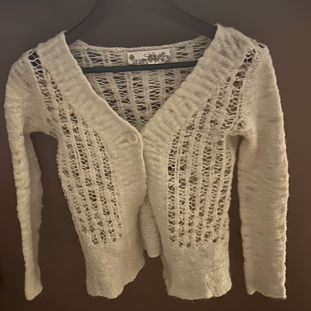 Cozy medium fits like a small sweater coverup